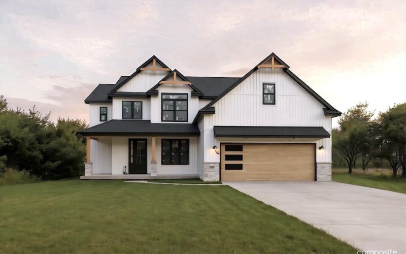 Two-story modern farmhouse with white siding, black trim, wooden accents, and a double garage, situated on a grassy lawn with a concrete driveway.